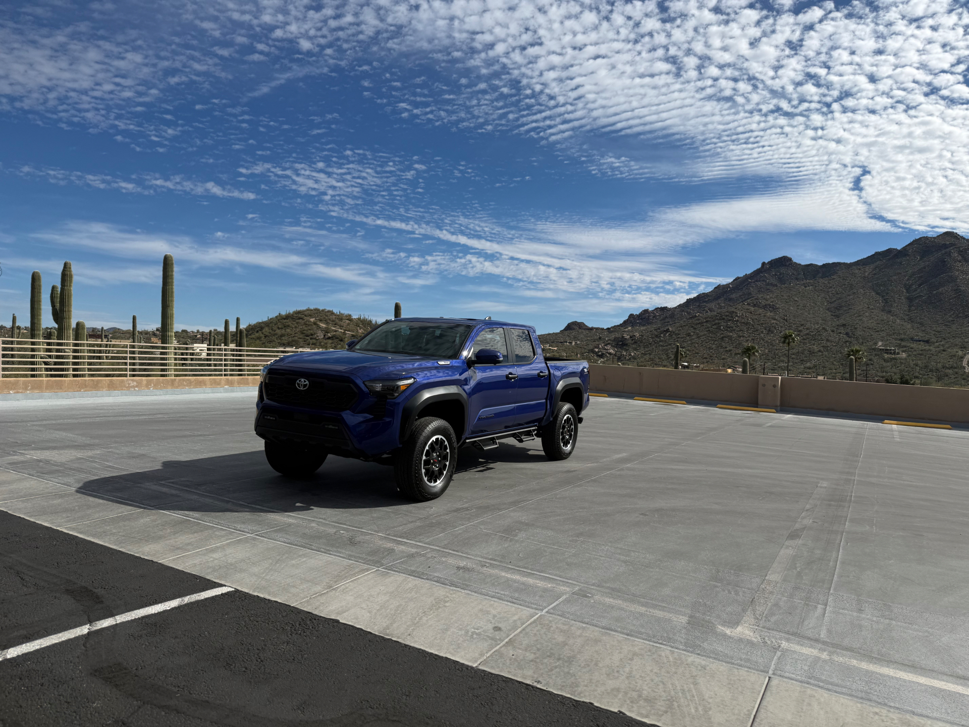 Detailed blue Toyota Tacoma in the Arizona desert
